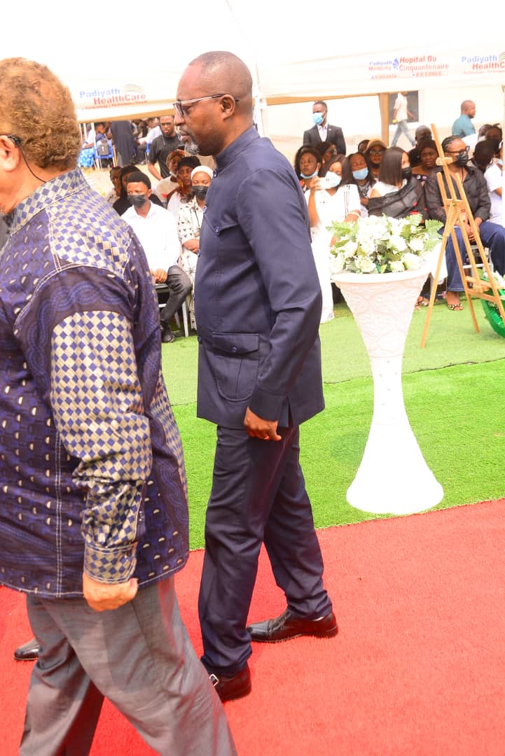 Dr. Justin B. Mudekereza walking at a public gathering